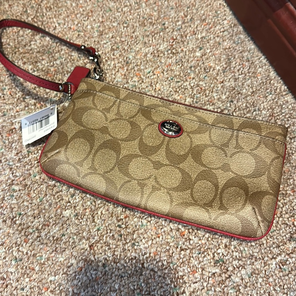 Coach wristlet tan/red